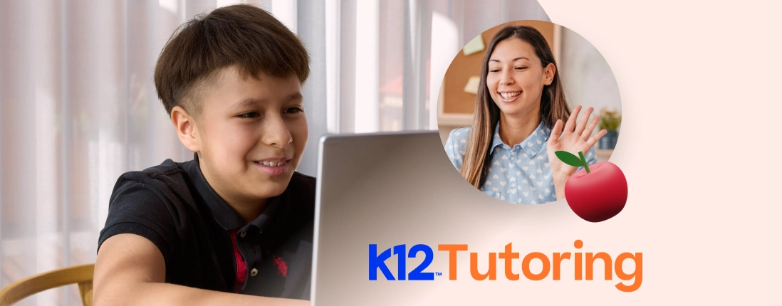 A boy smiles at a laptop with a picture-in-picture of a woman waving, suggesting online learning. Text reads "K12 Tutoring" with an apple icon.
