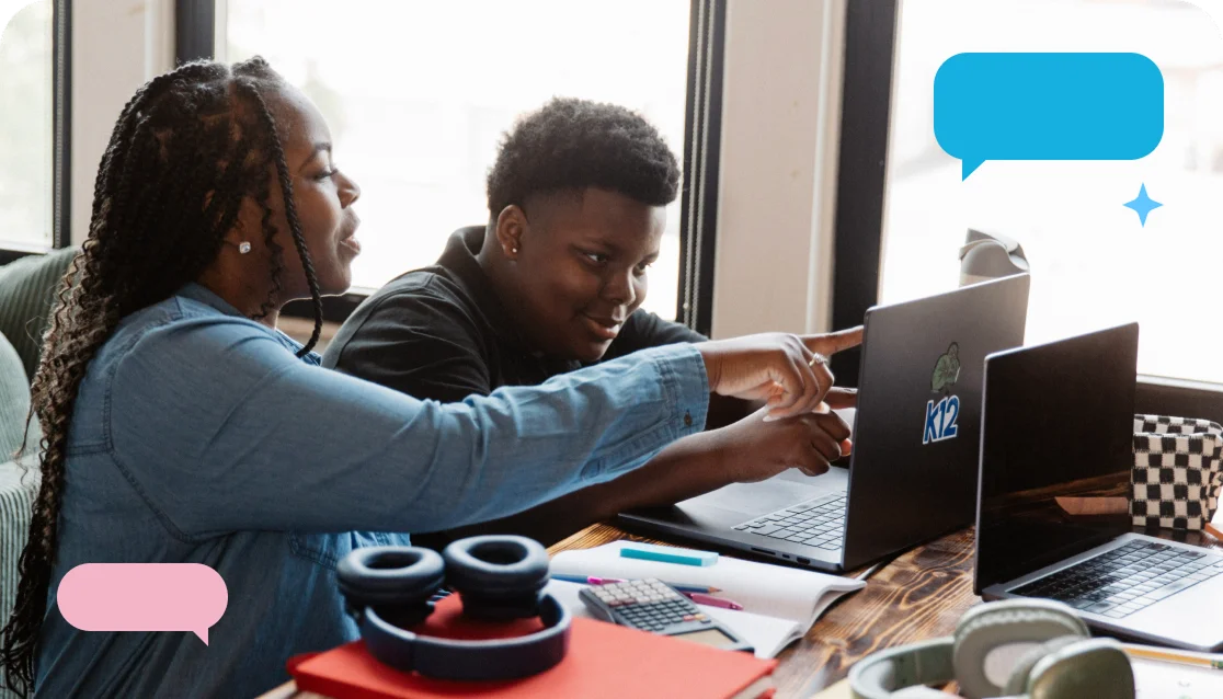A teacher guides a student at a laptop, both focused on the screen. Nearby, headphones and stationery suggest a learning environment. Speech bubbles add a communicative tone.