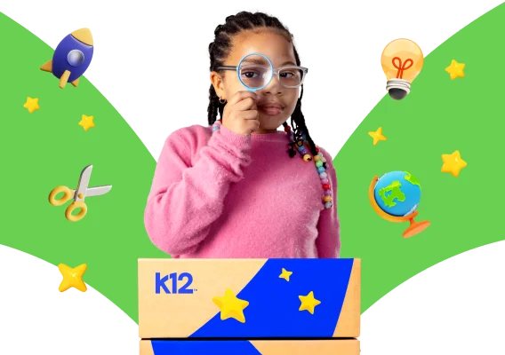 Young learner using a magnifying glass while standing behind a K12-branded box. Educational graphics, including a rocket, scissors, light bulb, globe, and star illustrations, appear around the learner against a green graphic background.