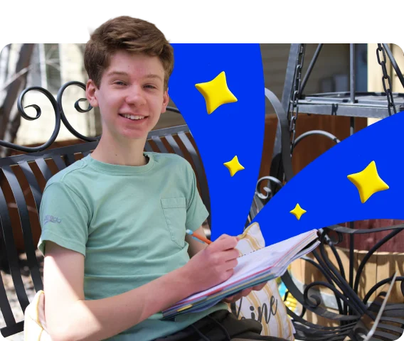 Person seated outdoors on a bench, writing in a notebook while studying. Decorative blue graphic shapes and yellow star illustrations appear in the background.