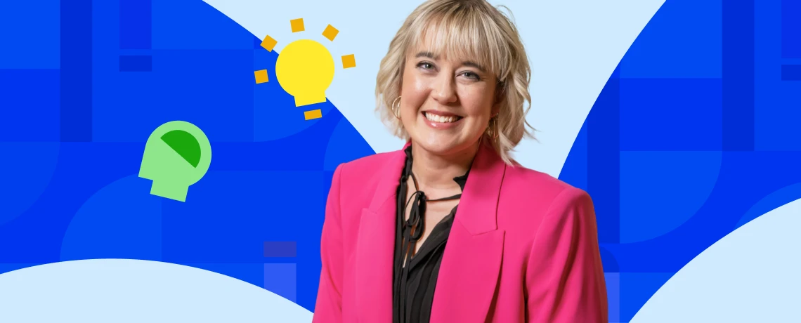 Smiling woman in a pink blazer against a vibrant blue background with abstract shapes. A yellow lightbulb and green head icon convey creativity.