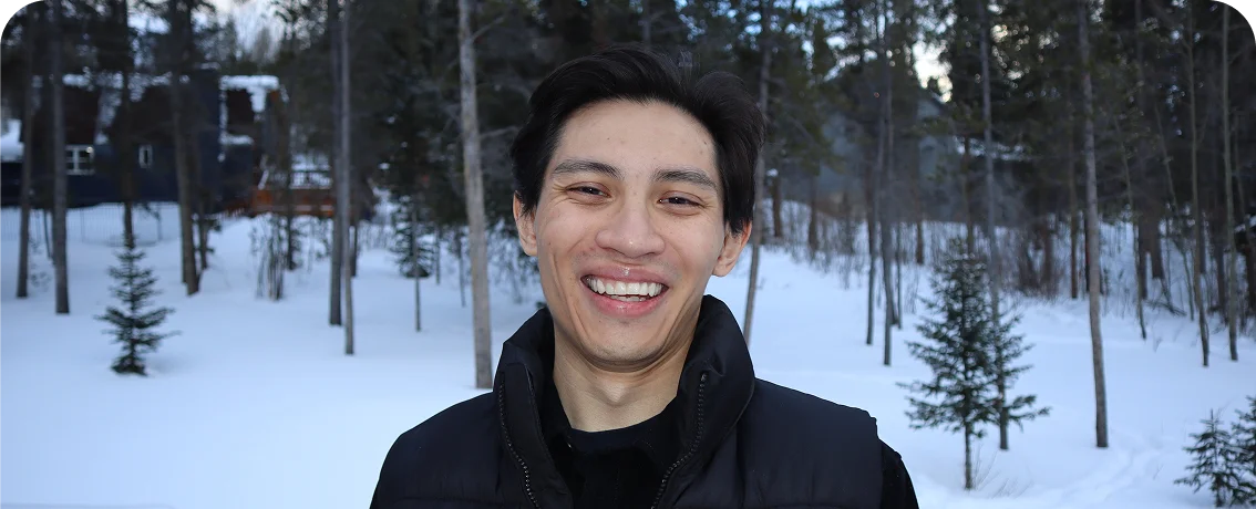 Esports participant or program representative outdoors in a winter setting, featured as part of a student esports community spotlight.