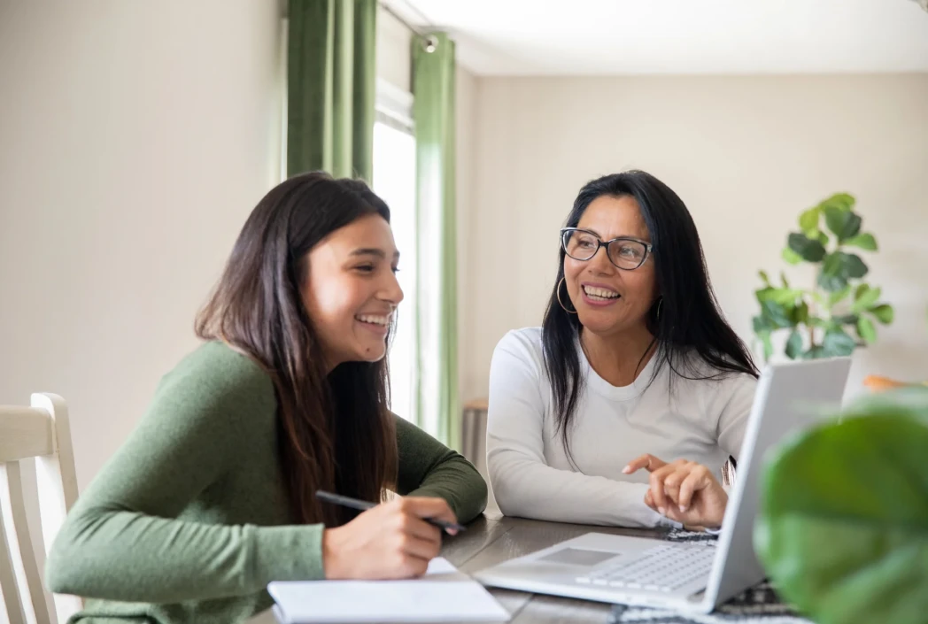 Teen student reviewing assignments and coursework from home, using flexible learning tools to stay organized and manage academic responsibilities.