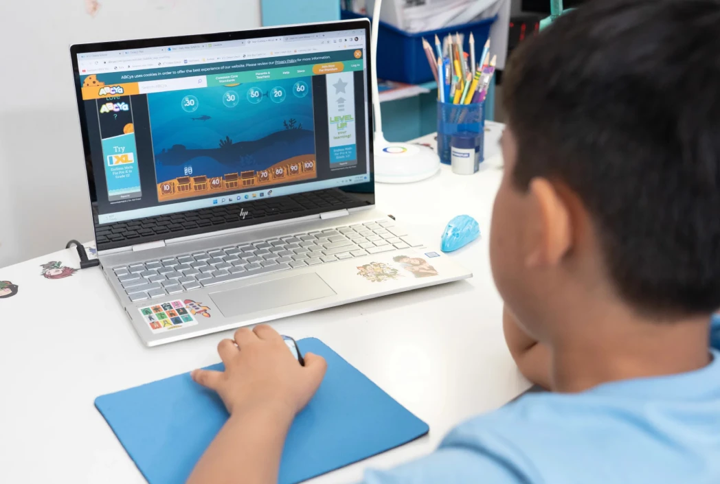 Student learning through an interactive online education platform, using gamified lessons to build knowledge and academic confidence.