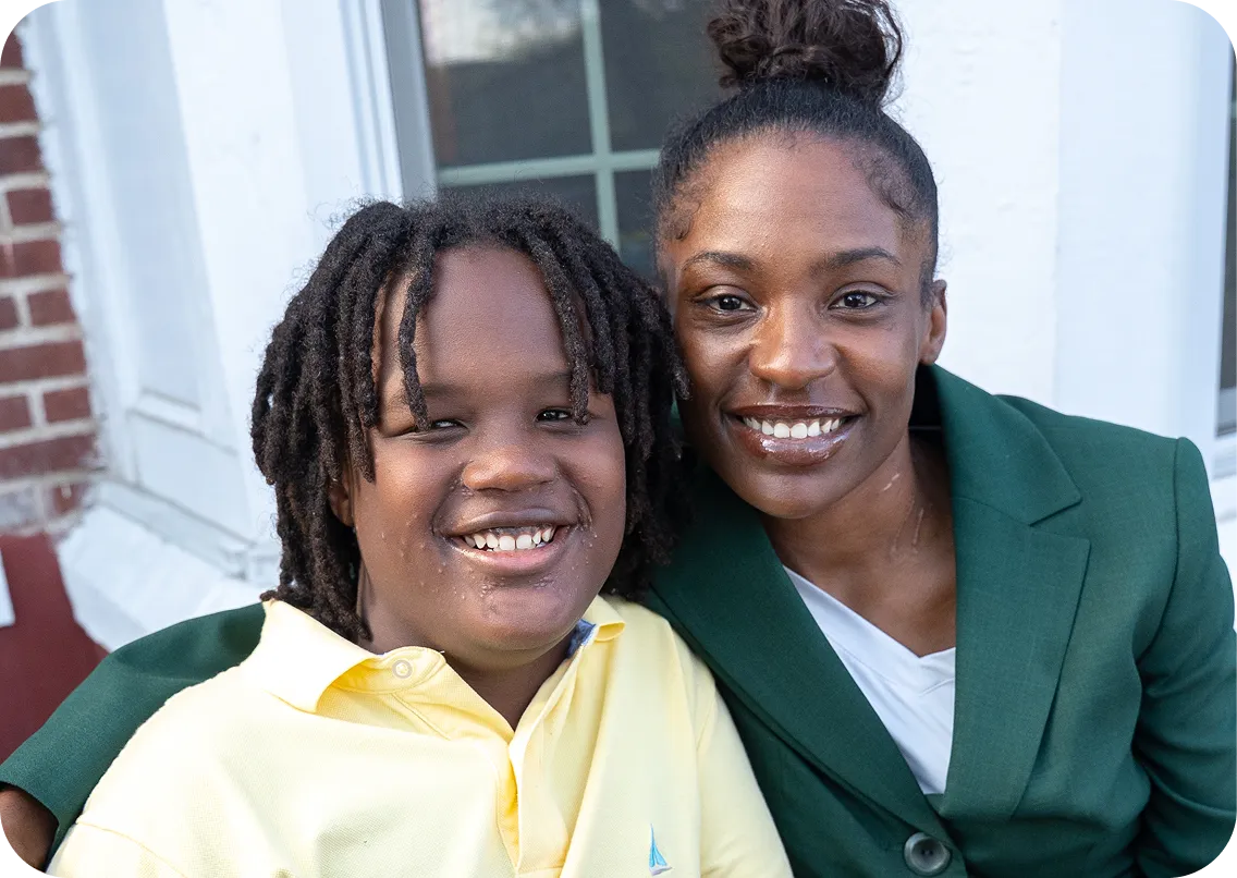 Parent and student together, illustrating family involvement, student support, and success in online school.